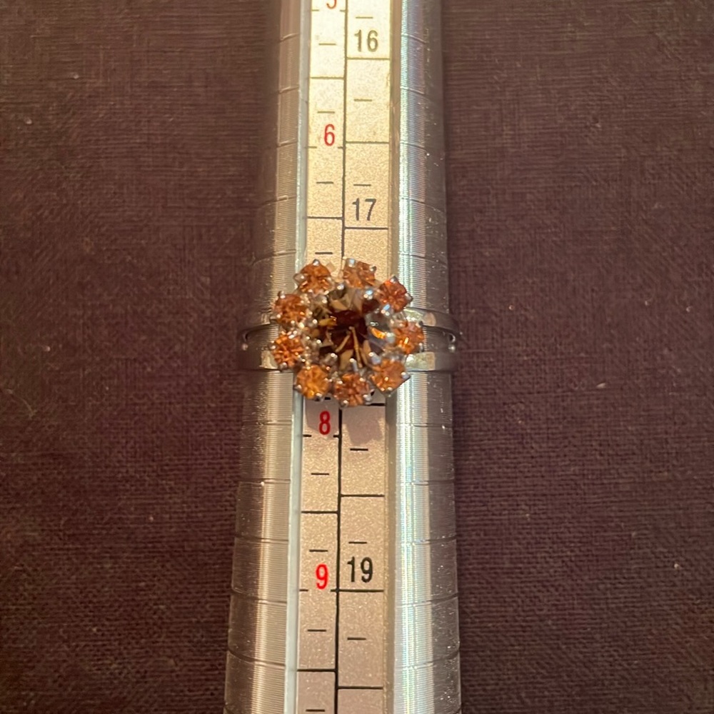 Silver and topaz ring